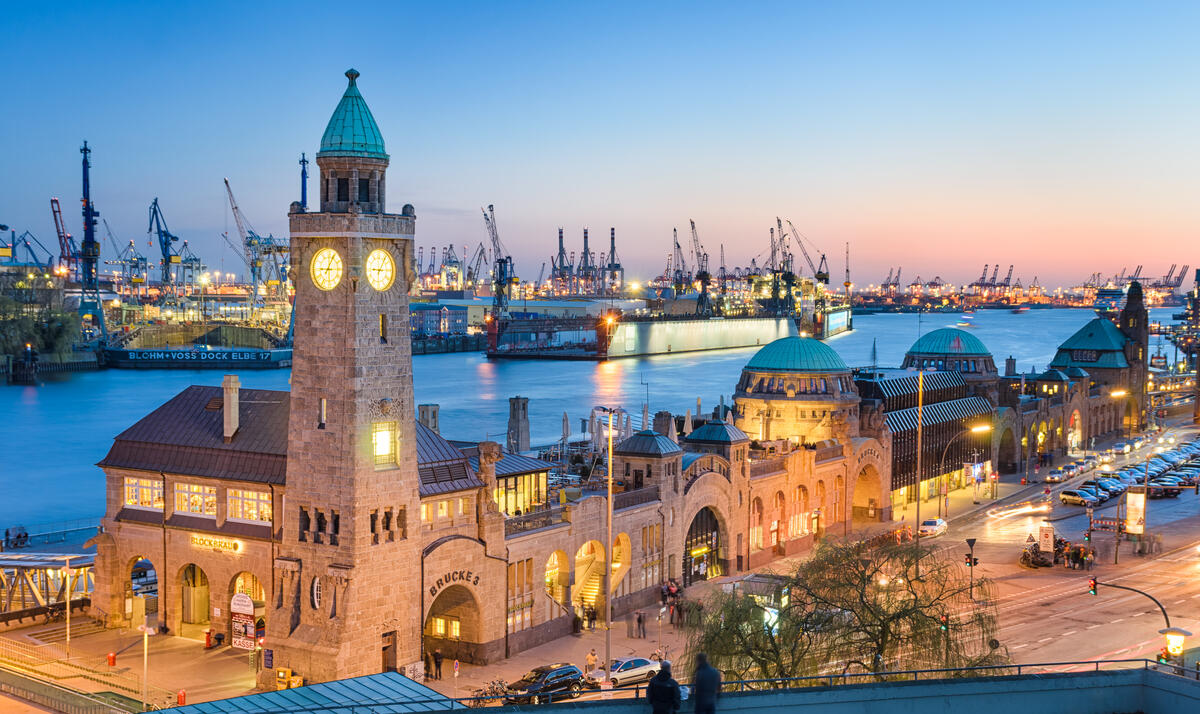 Landungsbrücken and Hamburg’s harbour at dusk.