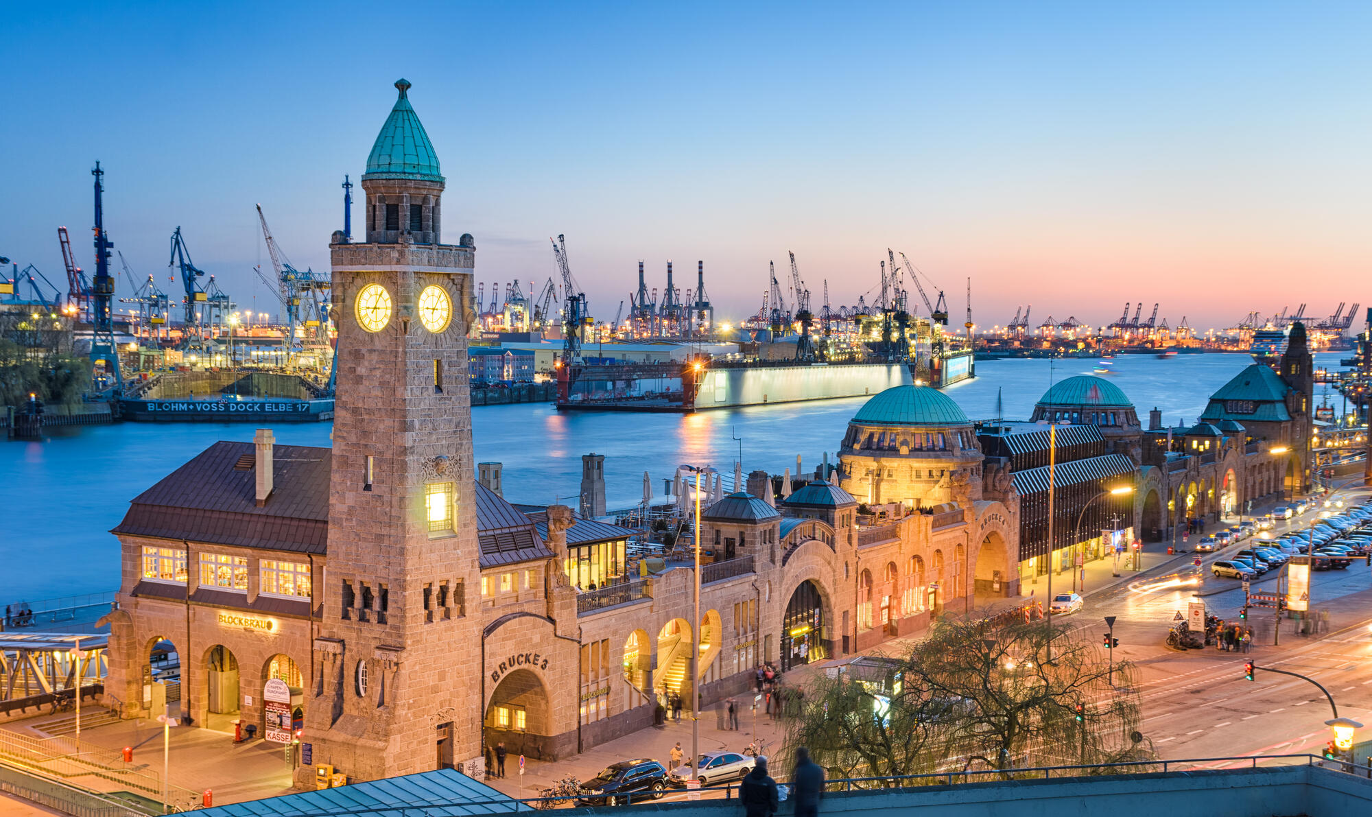 Landungsbrücken and Hamburg’s harbour at dusk.