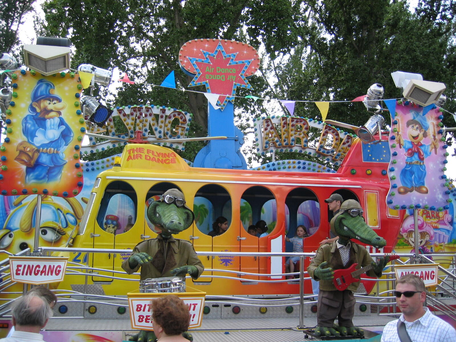 Colourful children’s ride with crocodile figures at the funfair