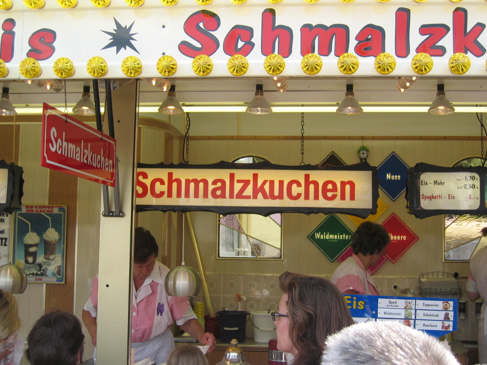 Stall with a sign reading “Schmalzkuchen”