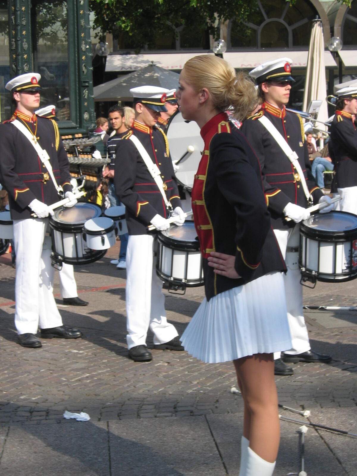 Leader of the girls’ guard in front of the drummers