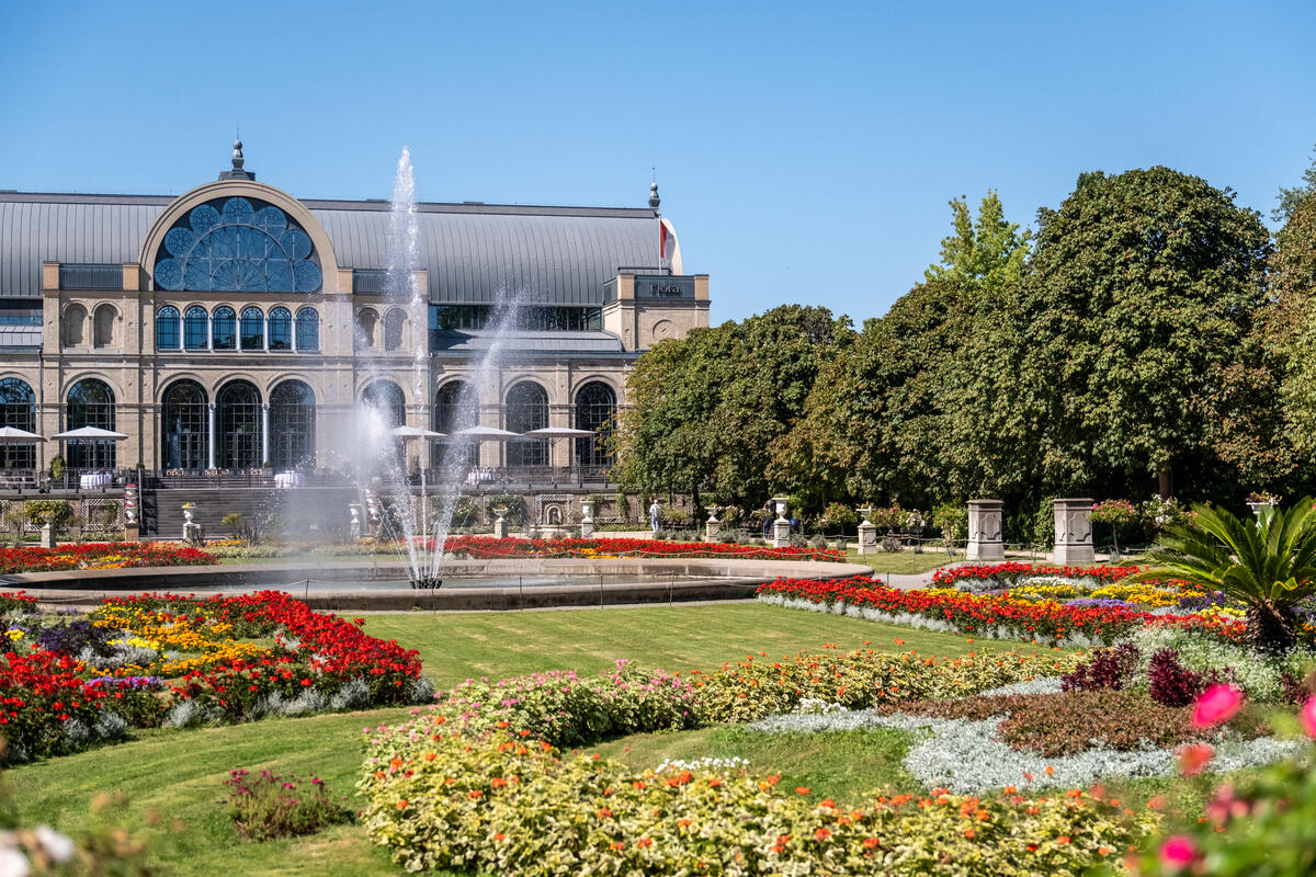 Flower beds and a fountain outside Cologne’s Flora.