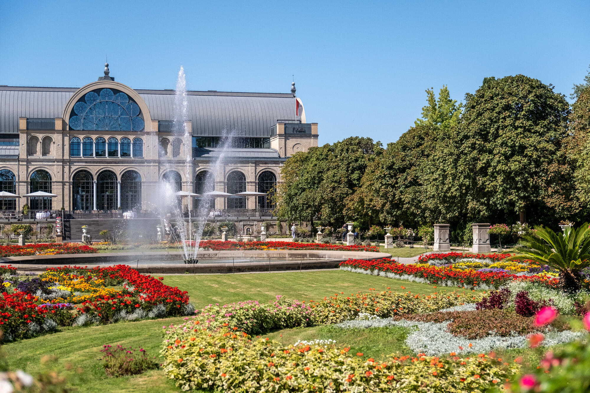Flower beds and a fountain outside Cologne’s Flora.