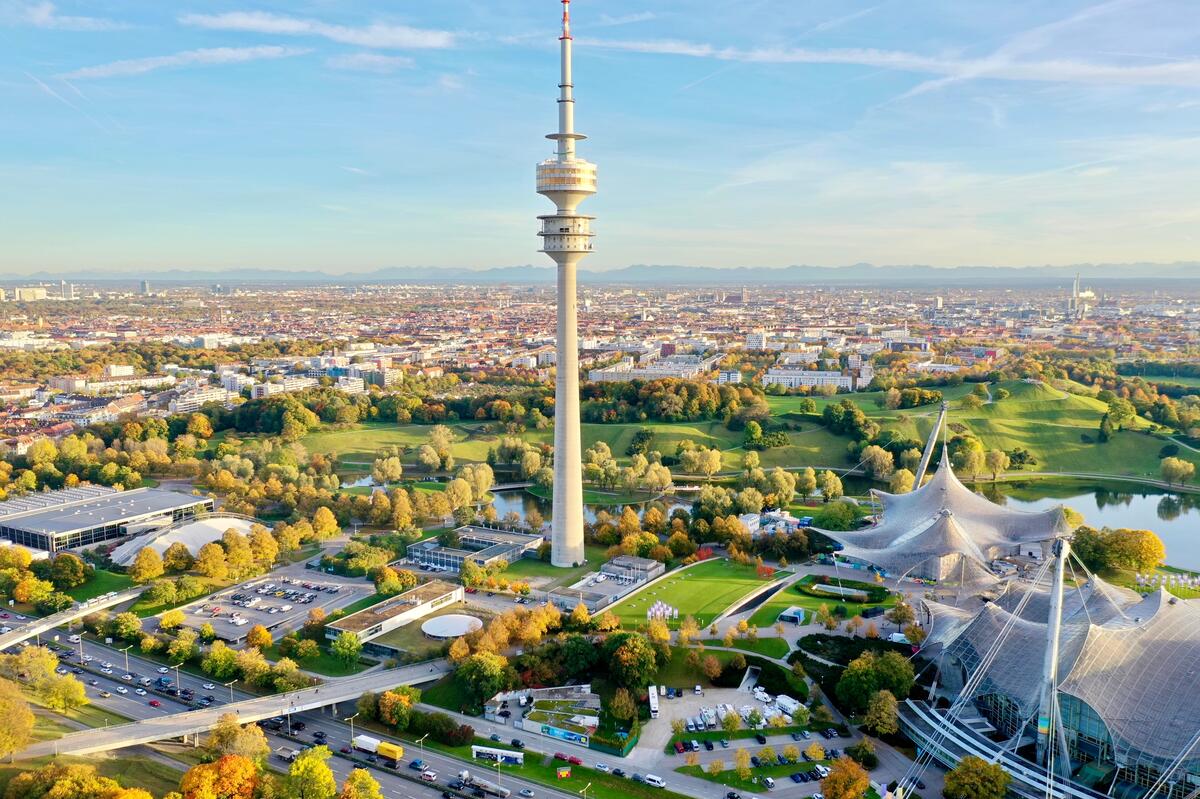 Aerial view of Munich’s Olympic Tower and stadium roofs.