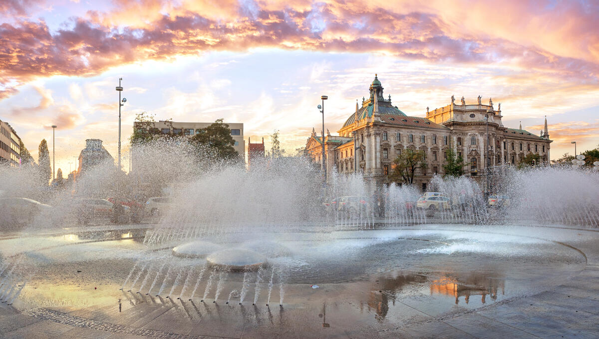 The fountain at Stachus in warm evening light.